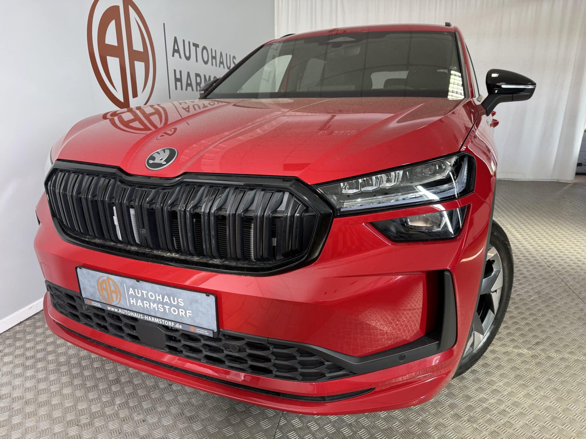 Nr. 69 Skoda Kodiaq 2.0 TDI 142 kW 4x4 Sportline 7-Sitze AHK -Velvet Rot Metallic